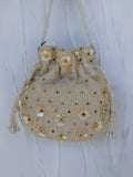 Ivory pearl Indian potli bag with 3D floral sequin detail and tassel drawstring