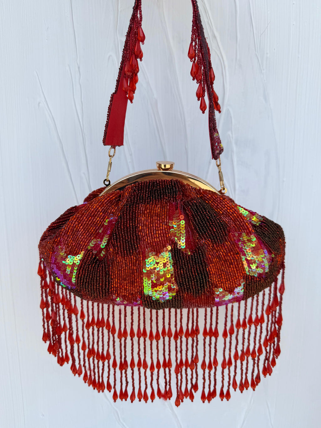Red beaded bridal potli clutch bag with tassels