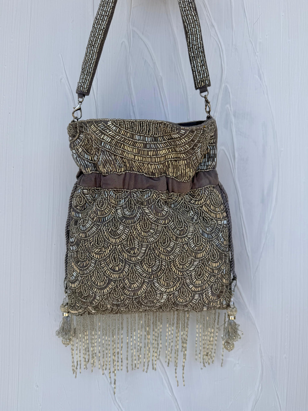Silver beaded Indian Potli bag with scallop pattern and fringe detail