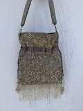 Silver beaded Indian Potli bag with scallop pattern and fringe detail